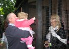 With Granddad Chris looking at a Nanny in a cage. Please do not feed!
